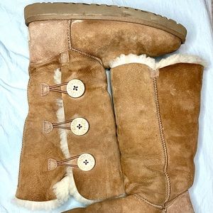 Ugg; light brown w/ buttons on outside
